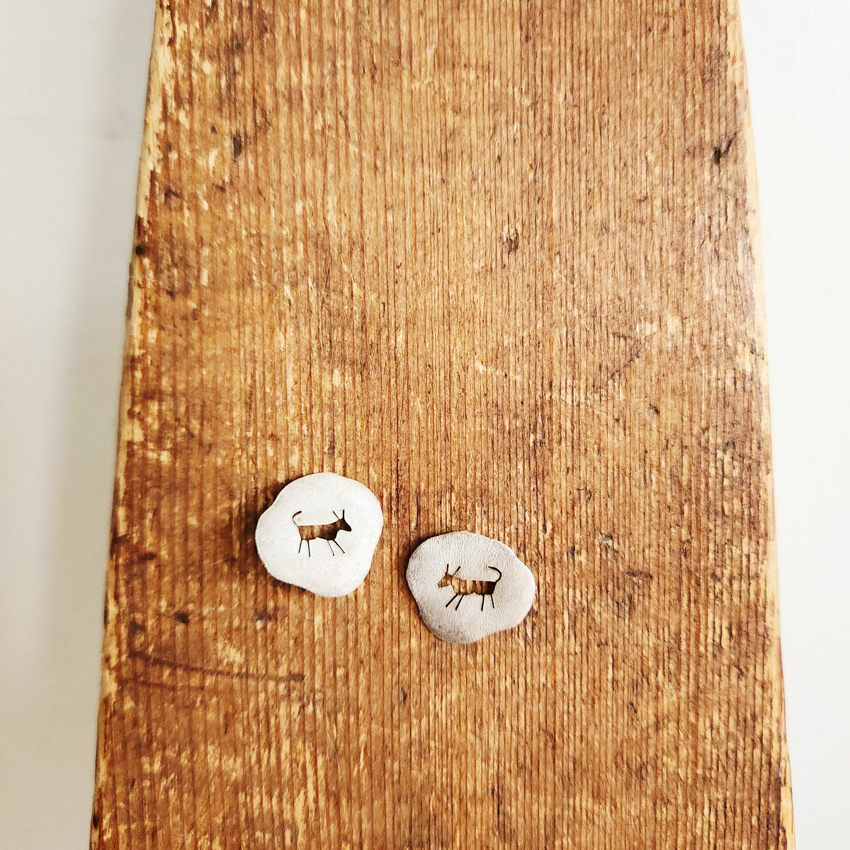 Sterling Silver Stud Earrings with Animal Cutout