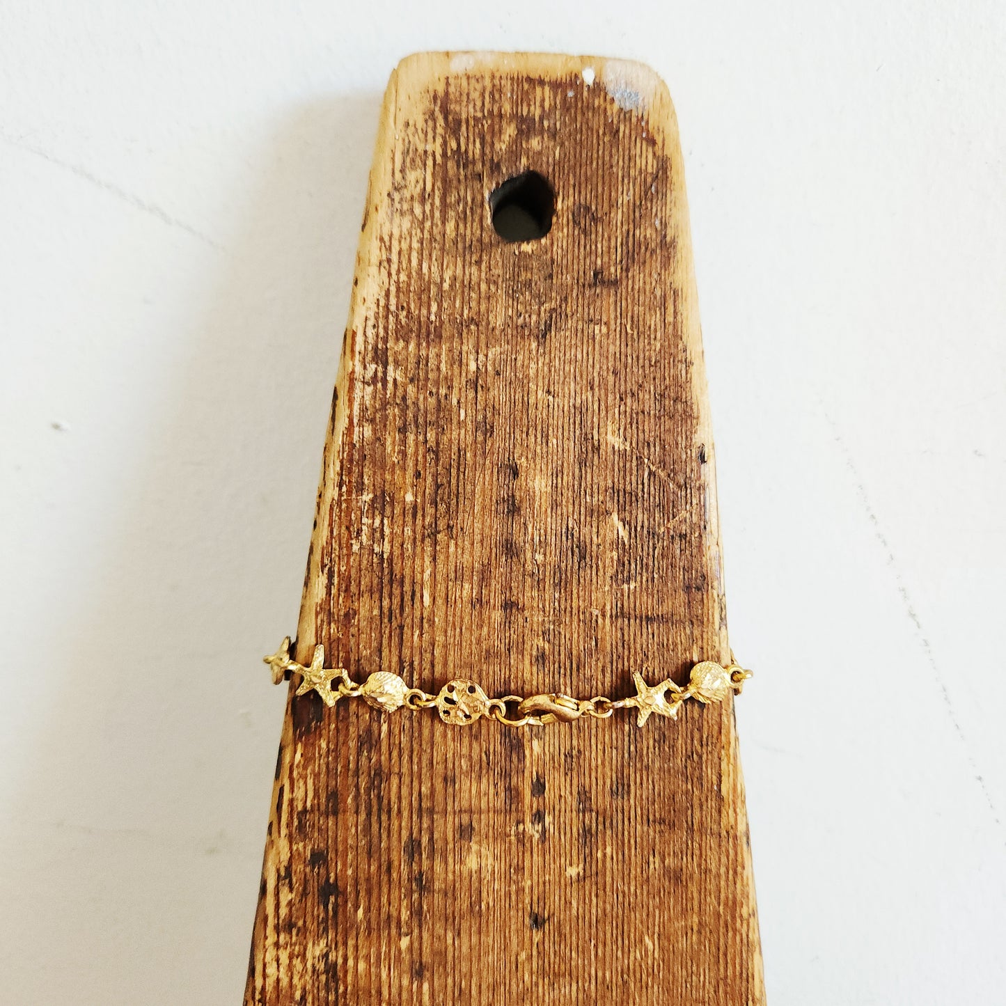 Goldtone Sand Dollars & Starfish Bracelet