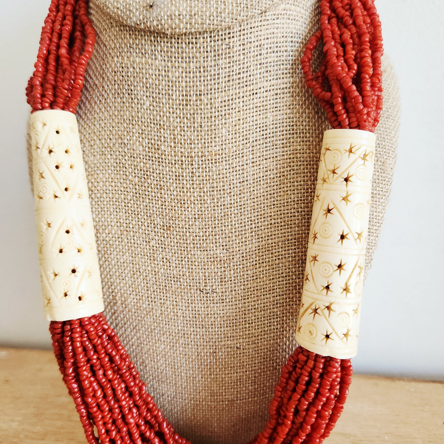 Multistrand Bead Necklace with Carving Details