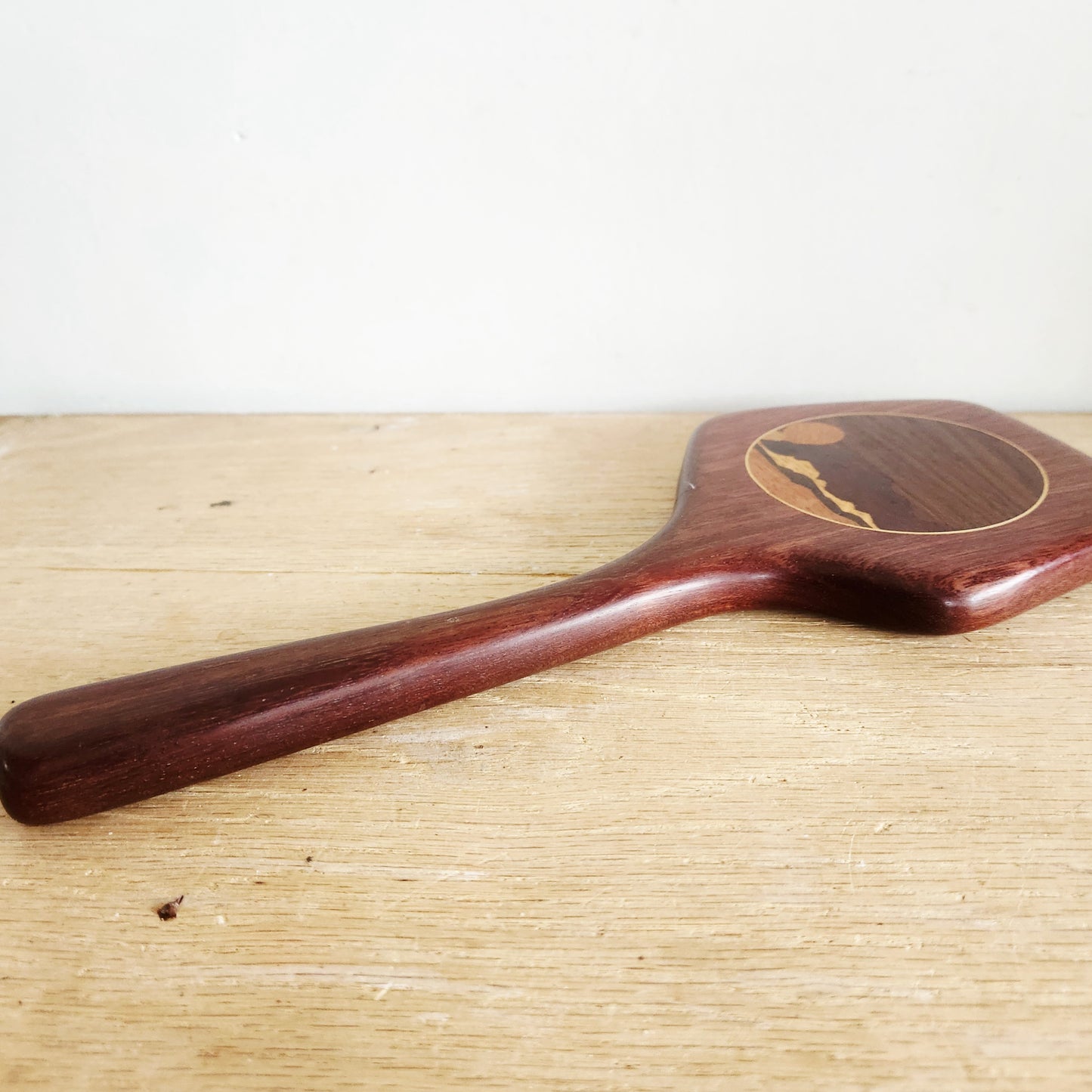 Handcrafted Wooden Hand Mirror with Scenic Inlay