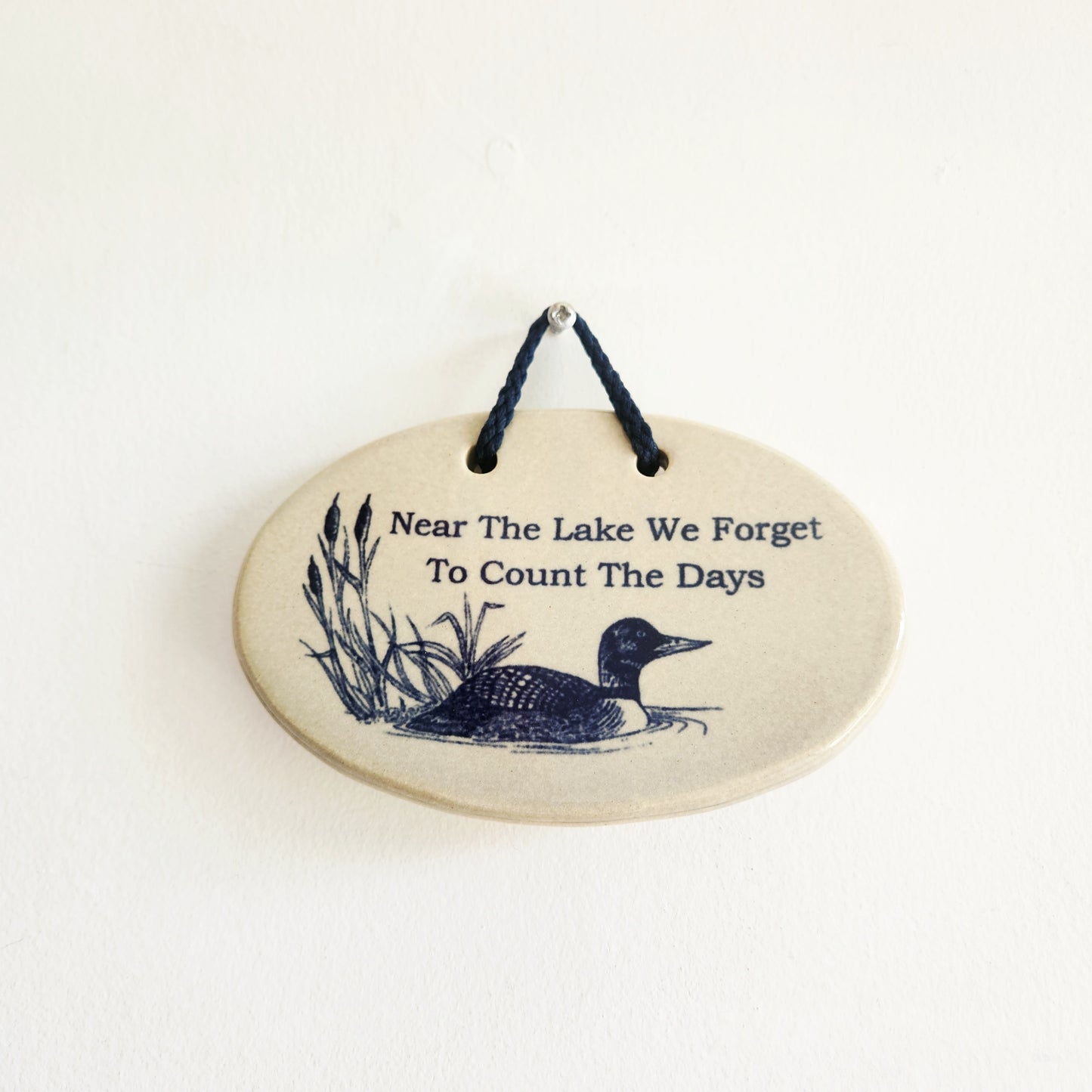 Mountain Meadows "Near the lake we forget to count the days" Wall Hanging