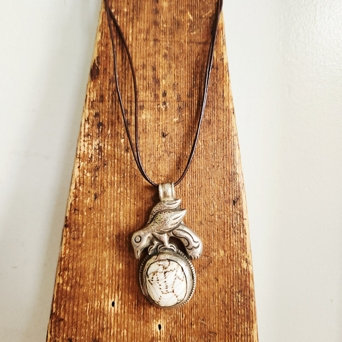 Cord Necklace with Oversized Bird Pendant