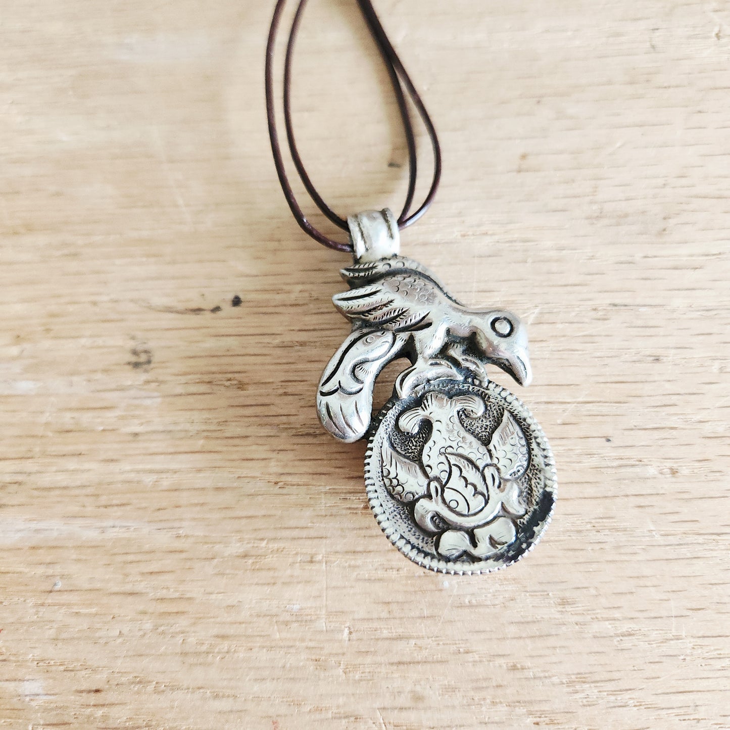 Cord Necklace with Oversized Bird Pendant
