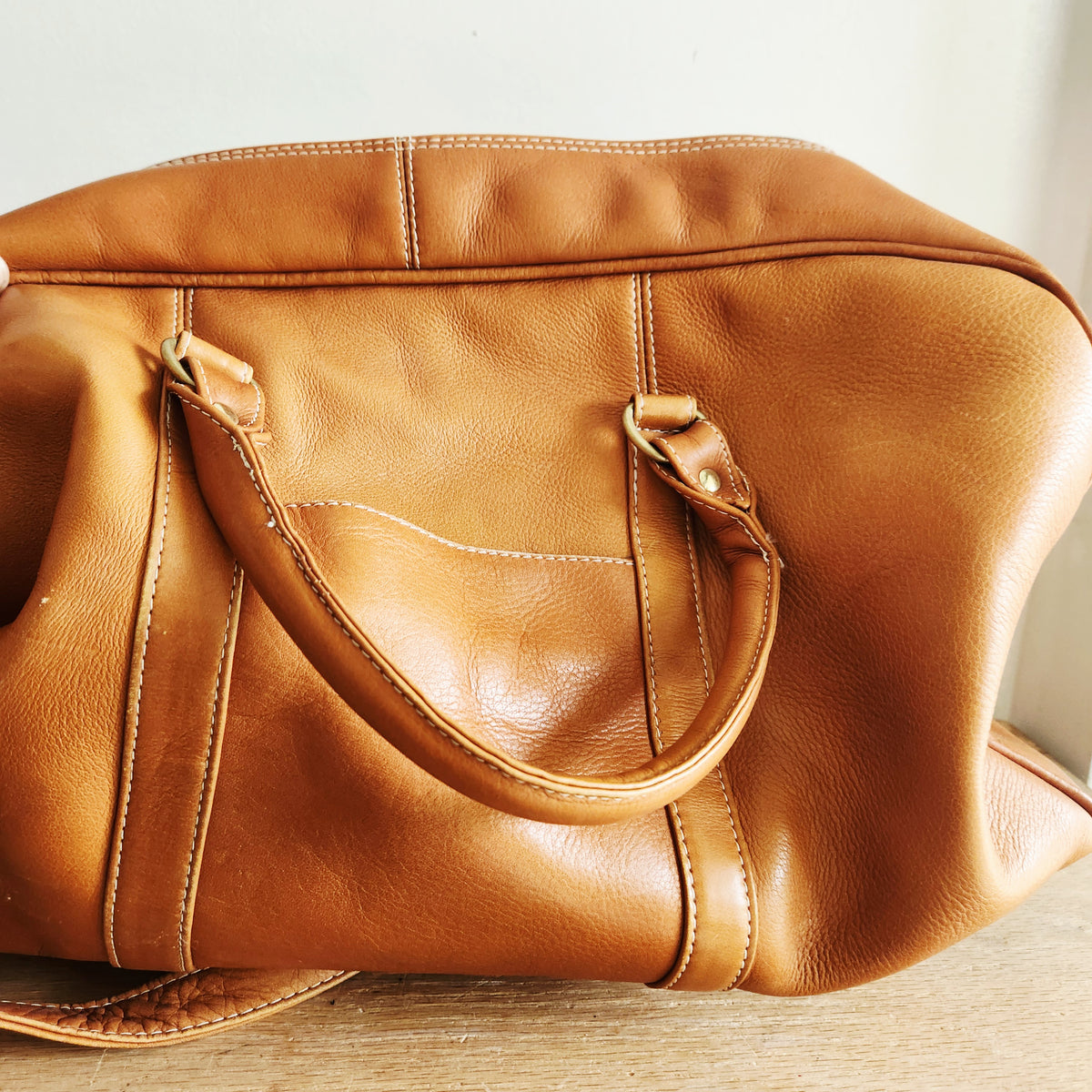 Latico Leathers Weekend Bag with Pockets says "Dealertrak"on one side