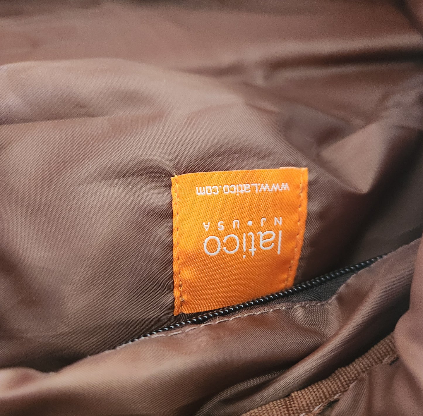 Latico Leathers Weekend Bag with Pockets says "Dealertrak"on one side