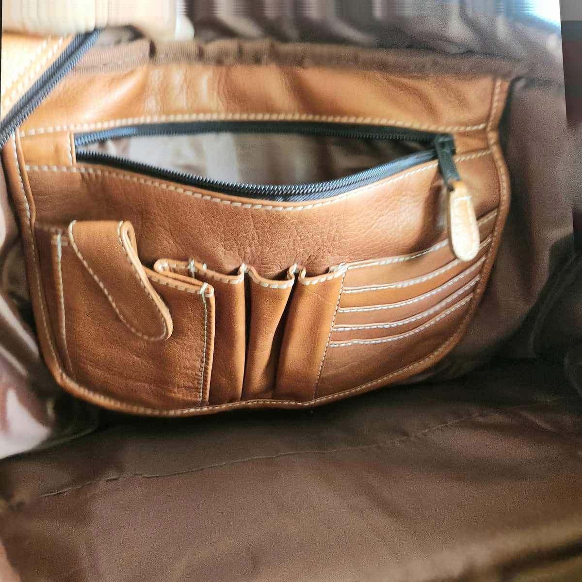 Latico Leathers Weekend Bag with Pockets says "Dealertrak"on one side