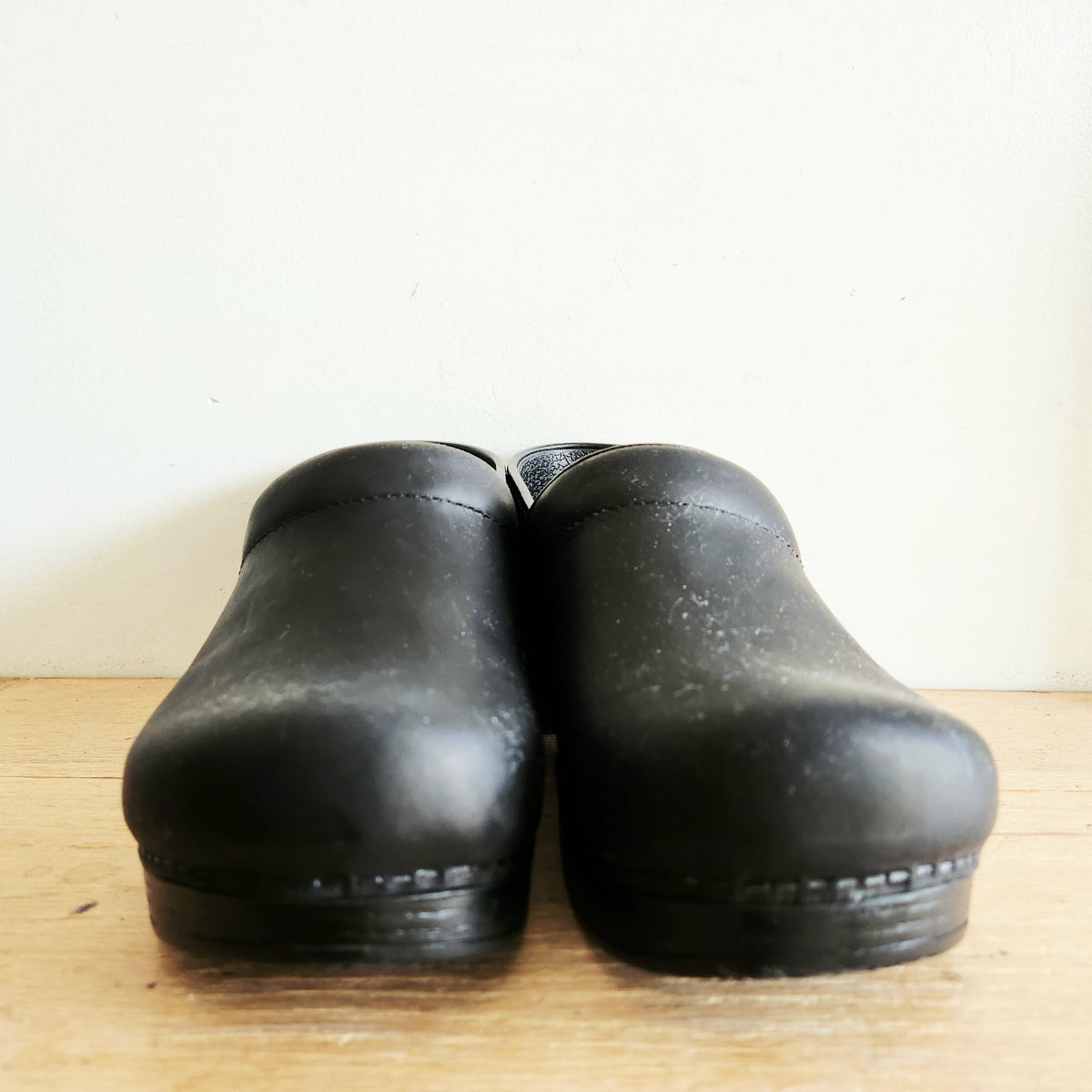 Dansko's Black Oiled Black Slip Ons Like New