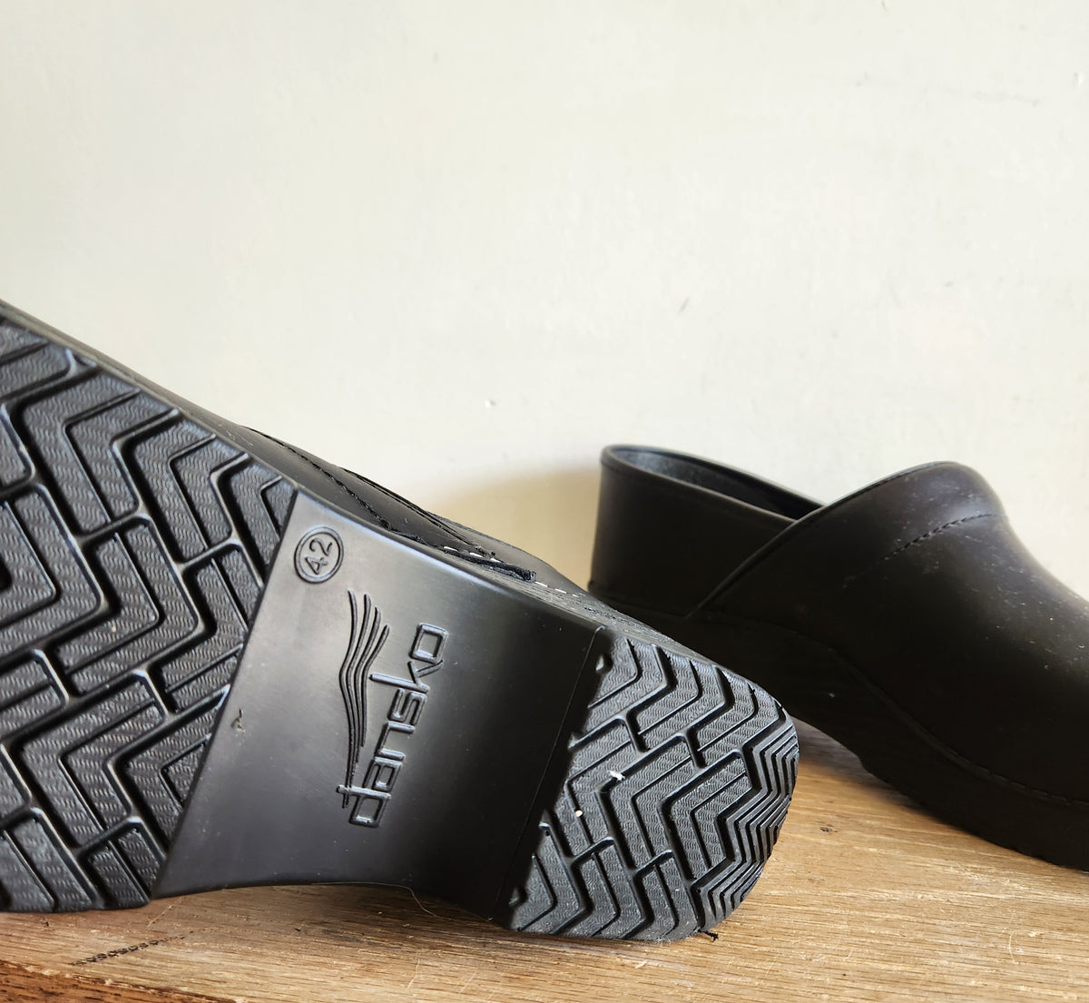Dansko's Black Oiled Black Slip Ons Like New