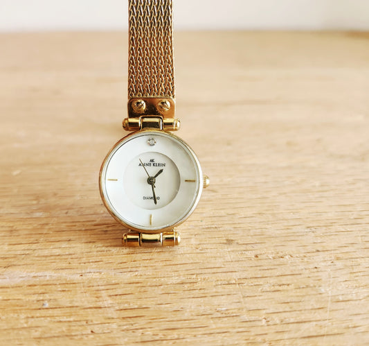 Anne Klein Women's Diamond Accent Gold Tone Watch works!