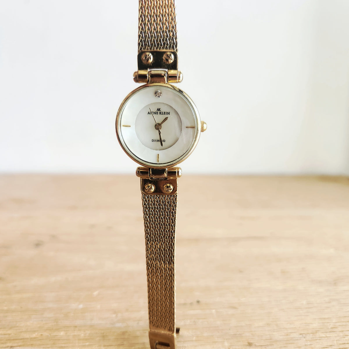 Anne Klein Women's Diamond Accent Gold Tone Watch works!